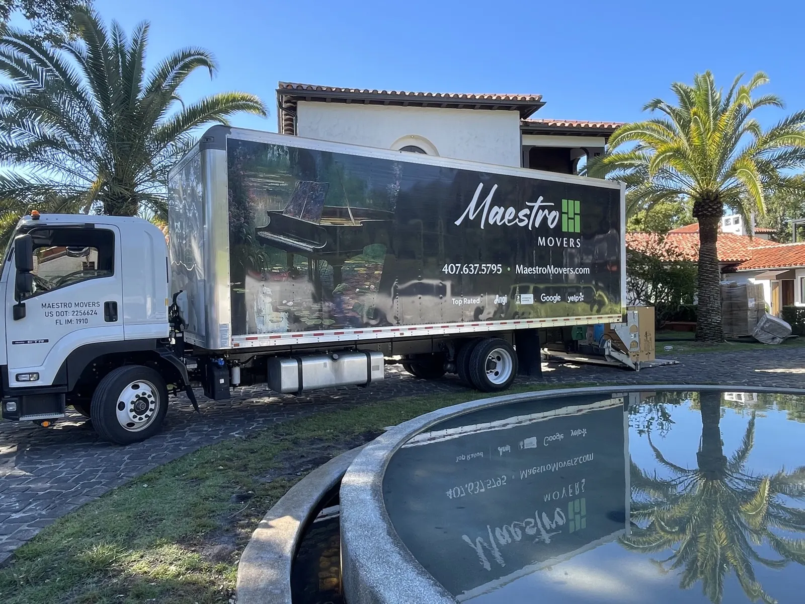 The branded Maestro Movers truck at a Central Florida estate